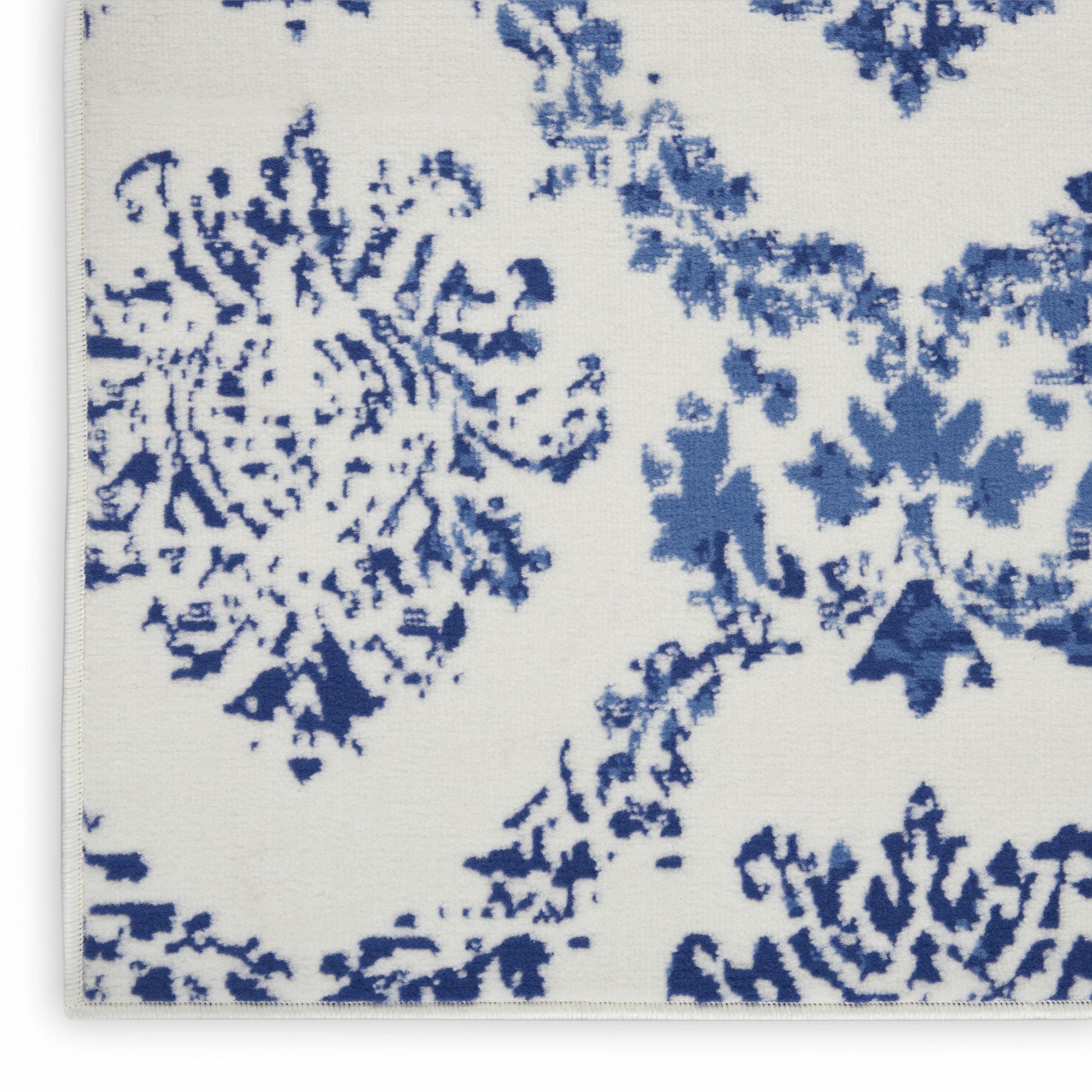 HomeRoots 5’ x 7’ Ivory and Navy Damask Area Rug