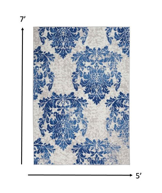 HomeRoots 5’ x 7’ Ivory and Navy Damask Area Rug
