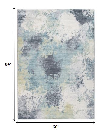 HomeRoots 5’ x 8’ Blue Yellow Abstract Sky Area Rug