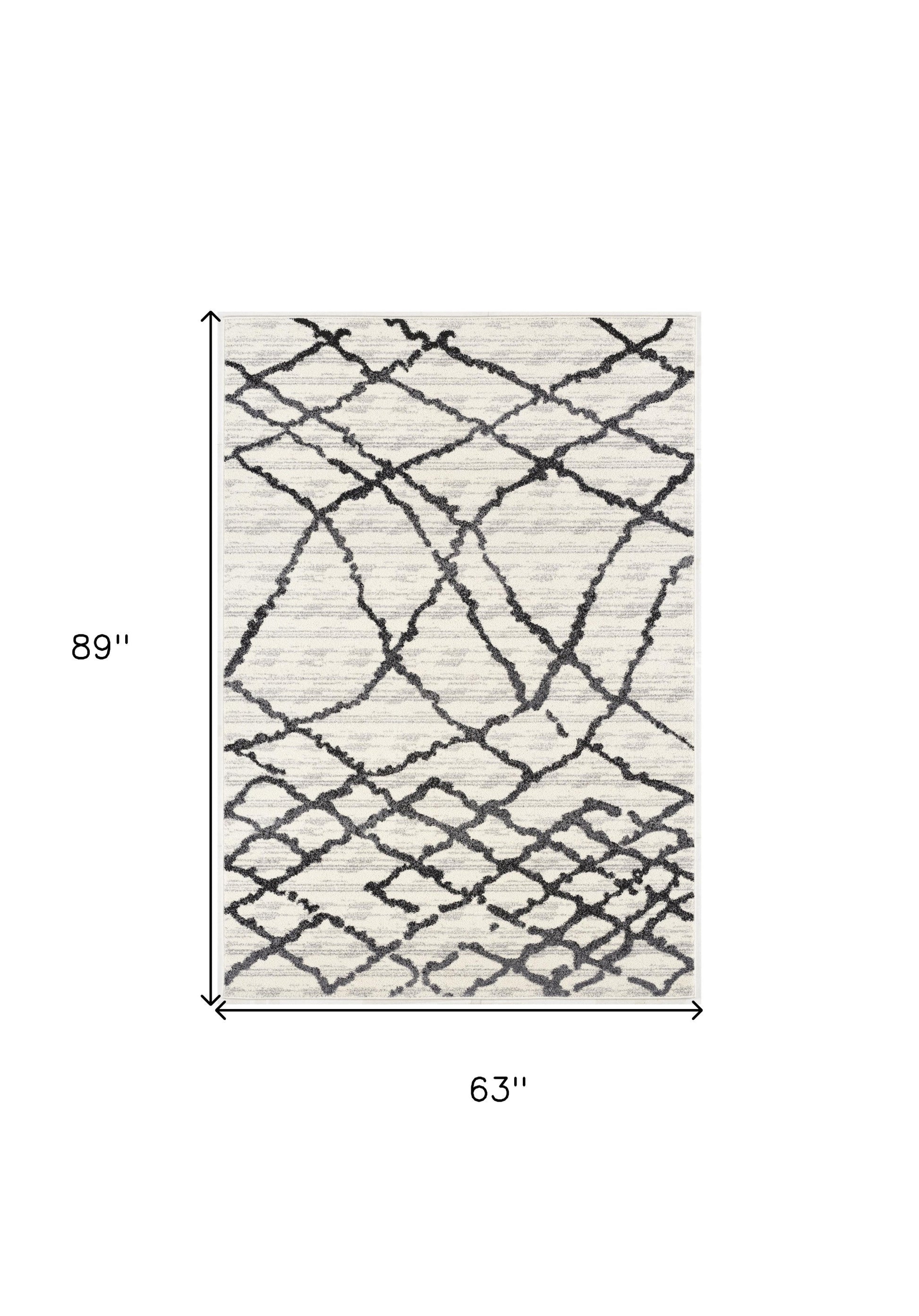 HomeRoots 5' x 8' Gray and Black Modern Abstract Area Rug
