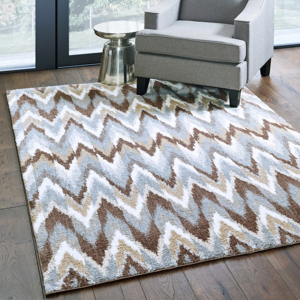 HomeRoots 5' x 8' Gray and Taupe Ikat Pattern Area Rug