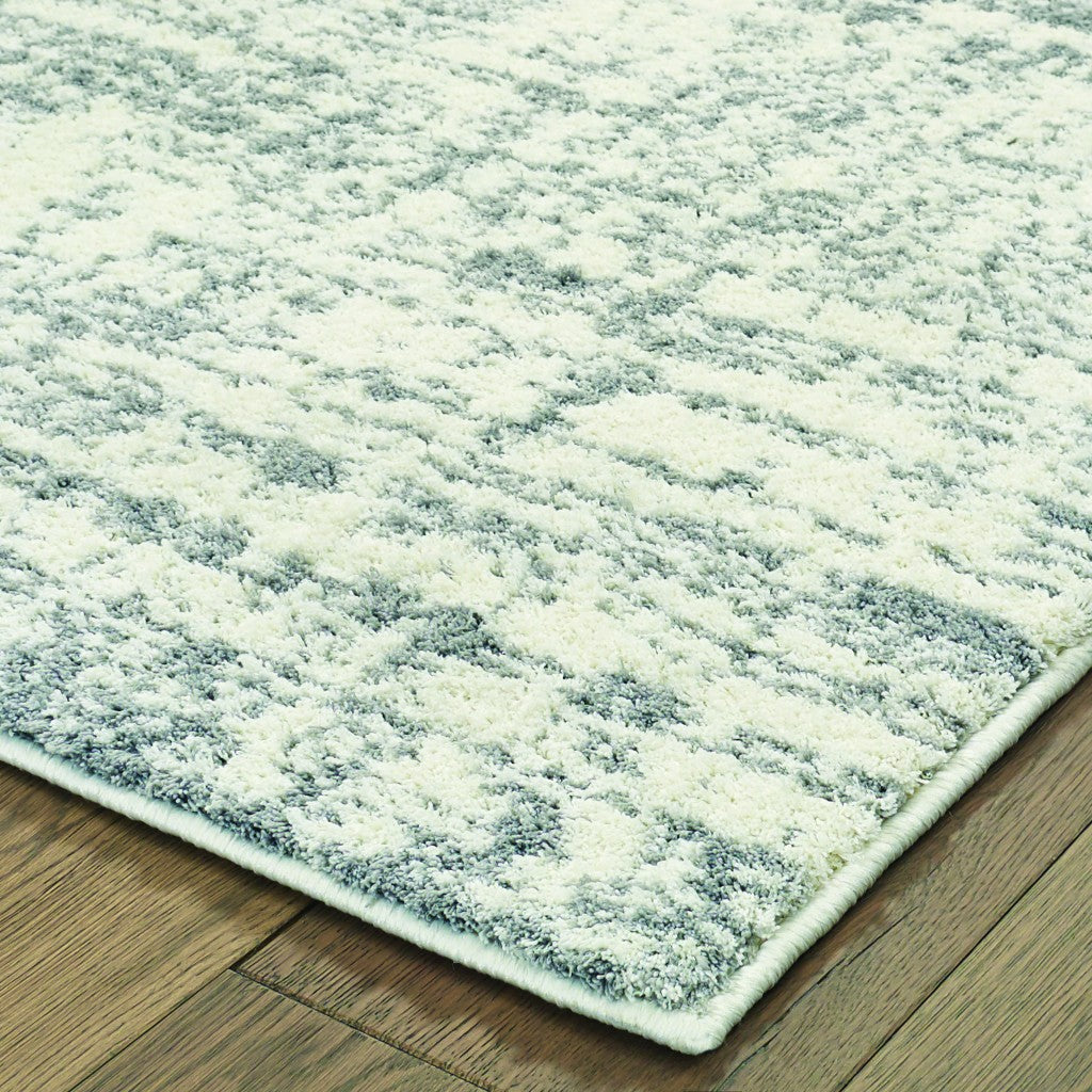 HomeRoots 5' x 8' Ivory and Gray Abstract Strokes Area Rug