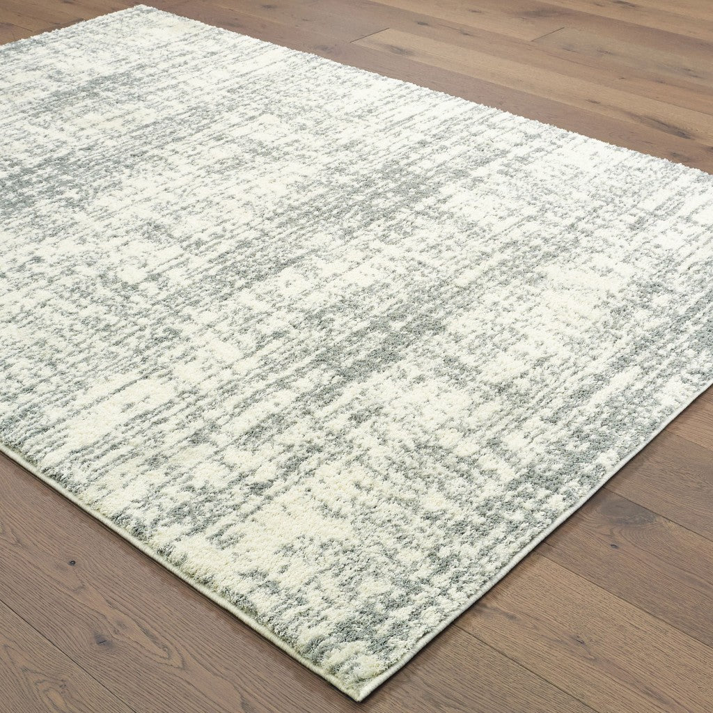 HomeRoots 5' x 8' Ivory and Gray Abstract Strokes Area Rug