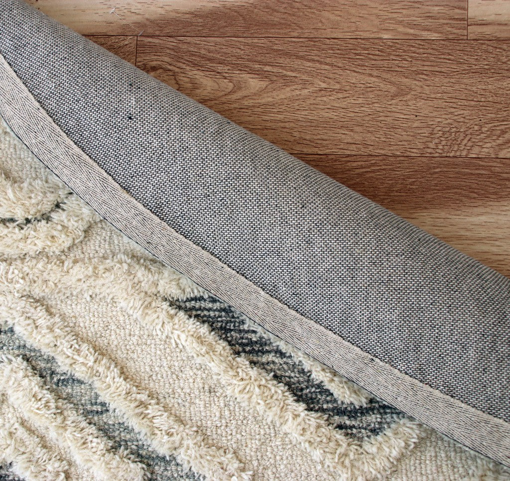 HomeRoots 6' Round Cream Modern Geometric Area Rug