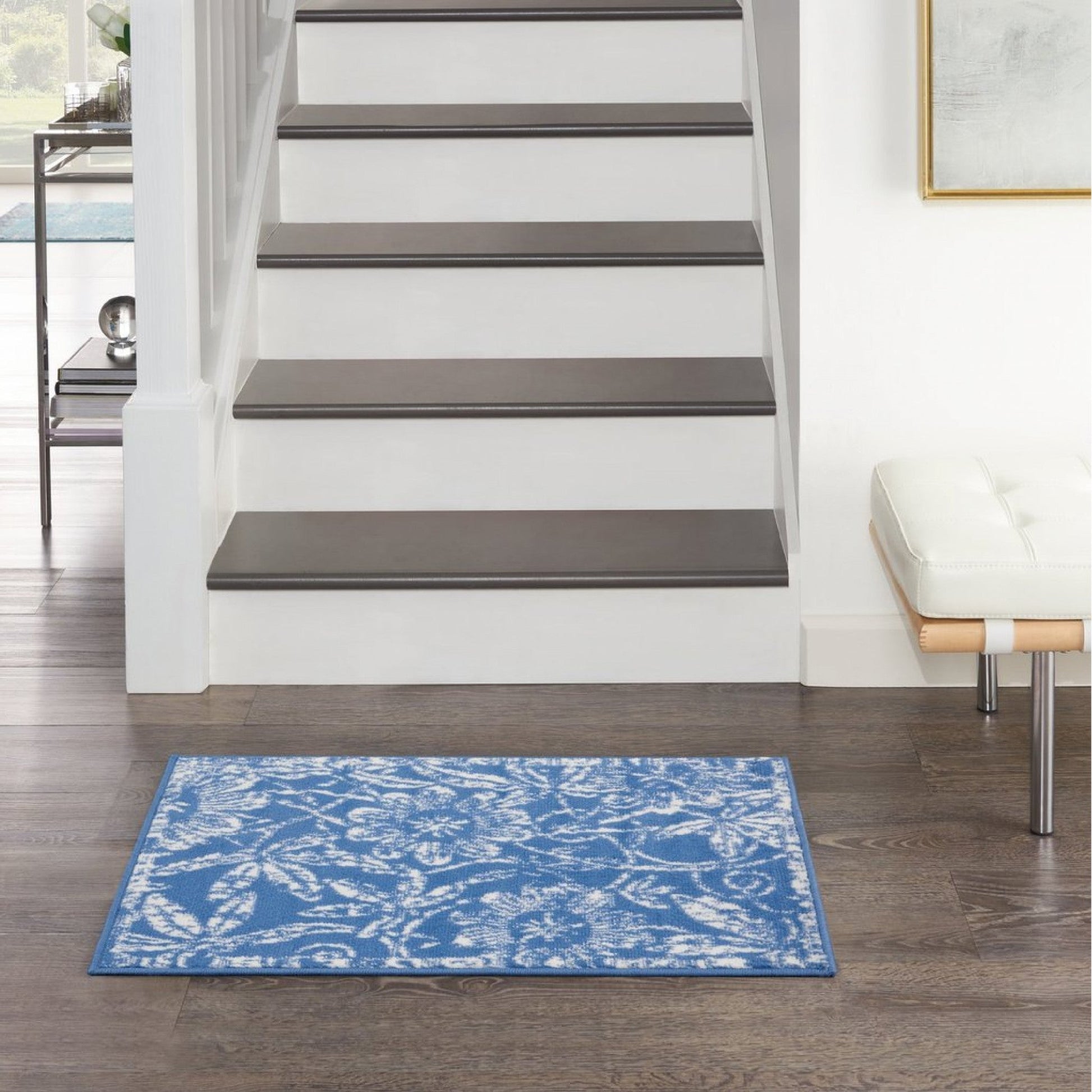 HomeRoots 6' x 9' Blue and Ivory Floral Vines Area Rug