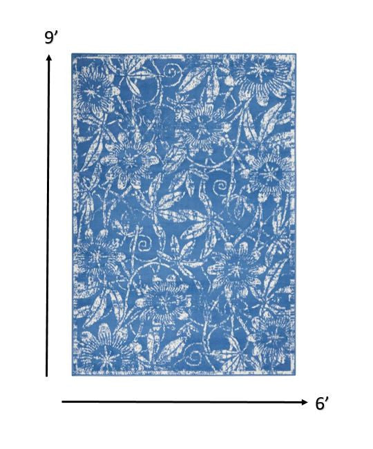HomeRoots 6' x 9' Blue and Ivory Floral Vines Area Rug