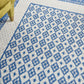 HomeRoots 6' x 9' Ivory and Blue Geometric Area Rug