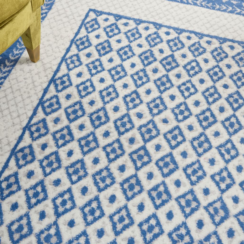 HomeRoots 6' x 9' Ivory and Blue Geometric Area Rug