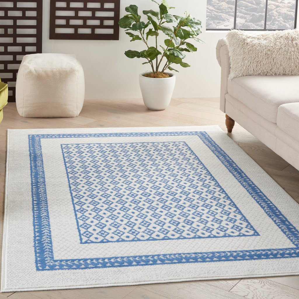 HomeRoots 6' x 9' Ivory and Blue Geometric Area Rug