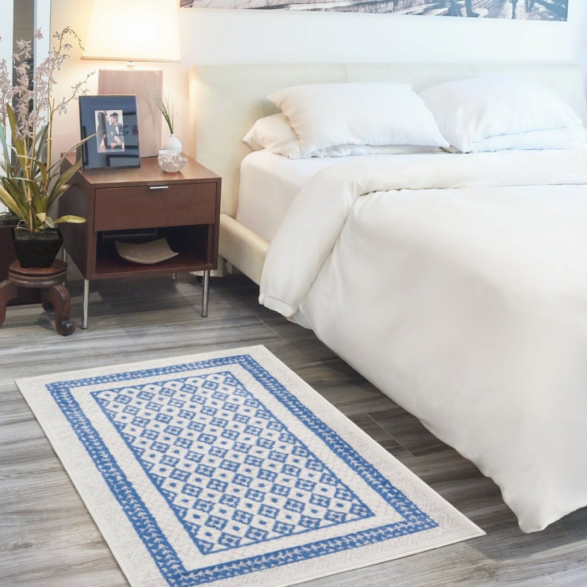 HomeRoots 6' x 9' Ivory and Blue Geometric Area Rug