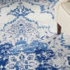 HomeRoots 6' x 9' Ivory and Blue Medallion Area Rug