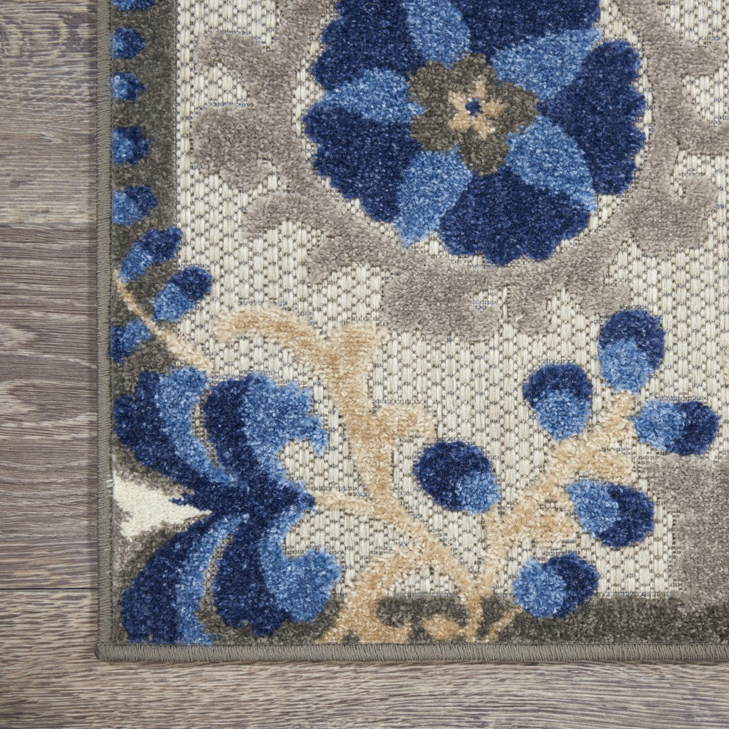 HomeRoots 6' x 9' Natural and Blue Indoor Outdoor Area Rug
