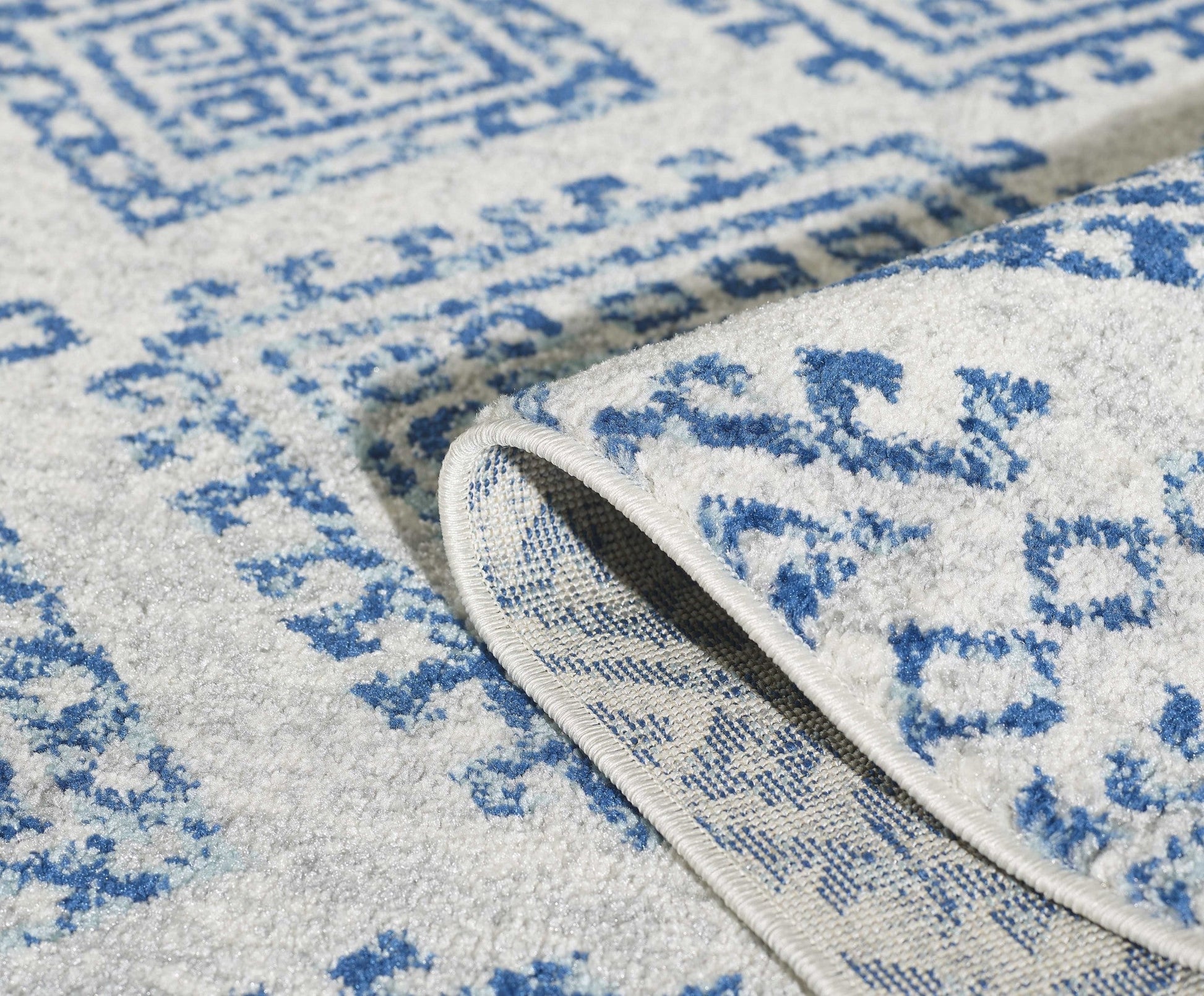 HomeRoots 7' Ivory Blue Machine Woven Distressed Geometric Indoor Runner Rug
