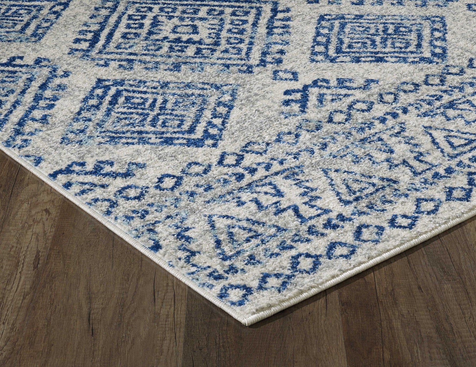 HomeRoots 7' Ivory Blue Machine Woven Distressed Geometric Indoor Runner Rug
