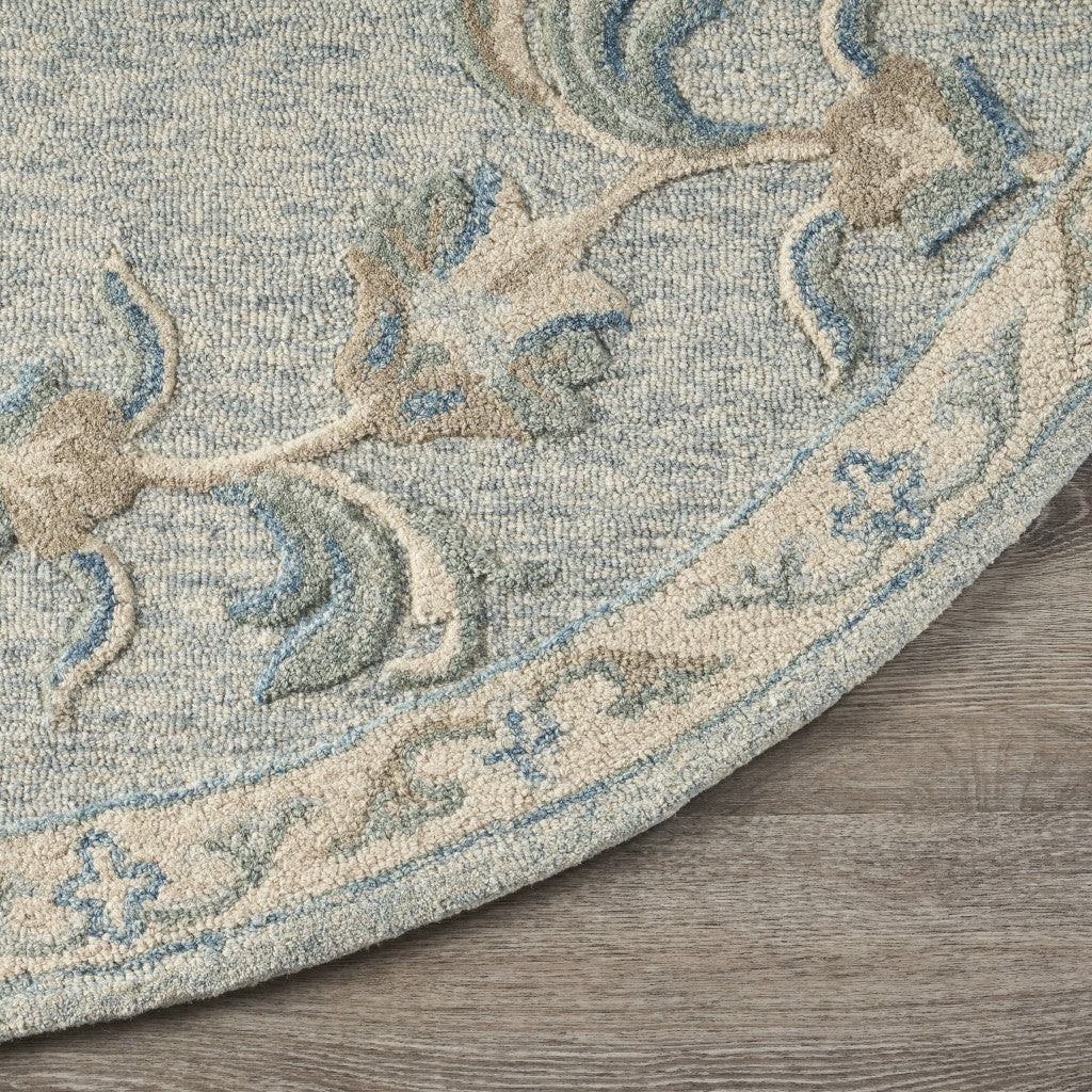 HomeRoots 7' Round Blue and Cream Filigree Area Rug