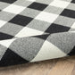 HomeRoots 8’ Round Black and Ivory Gingham Indoor Outdoor Area Rug