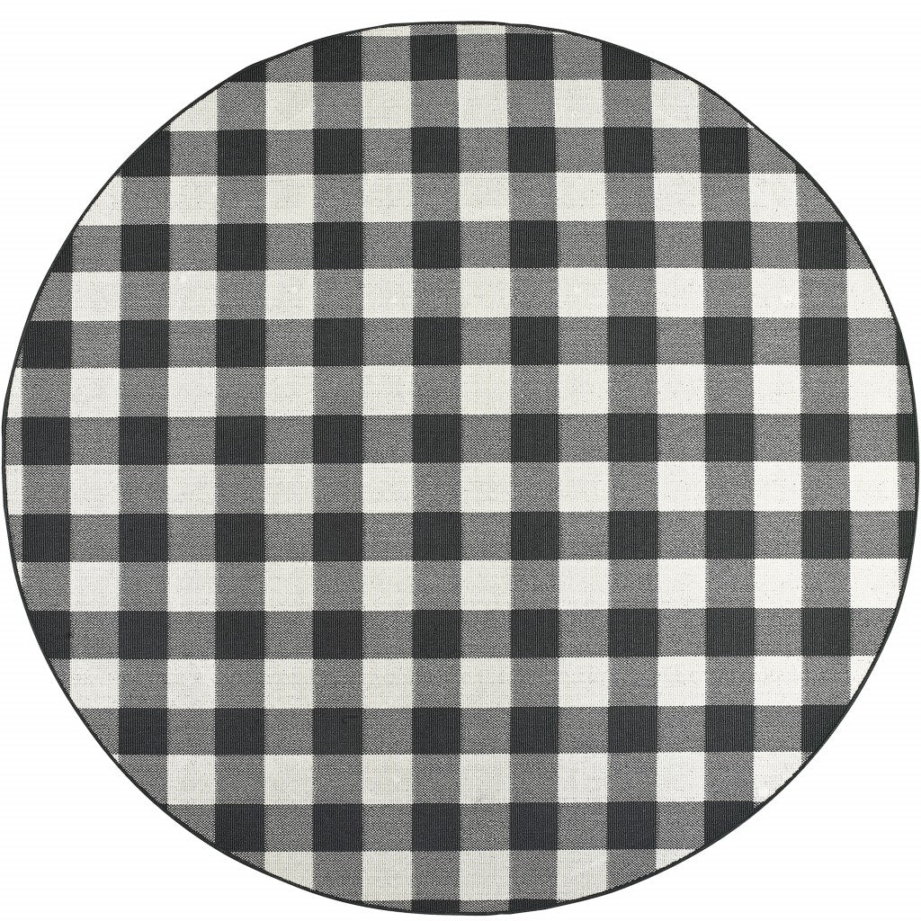 HomeRoots 8’ Round Black and Ivory Gingham Indoor Outdoor Area Rug