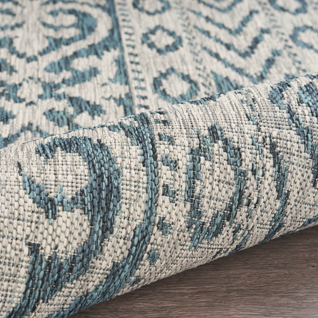 HomeRoots 8’ x 10’ Geometric Indoor Outdoor Area Rug in Blue Finiah