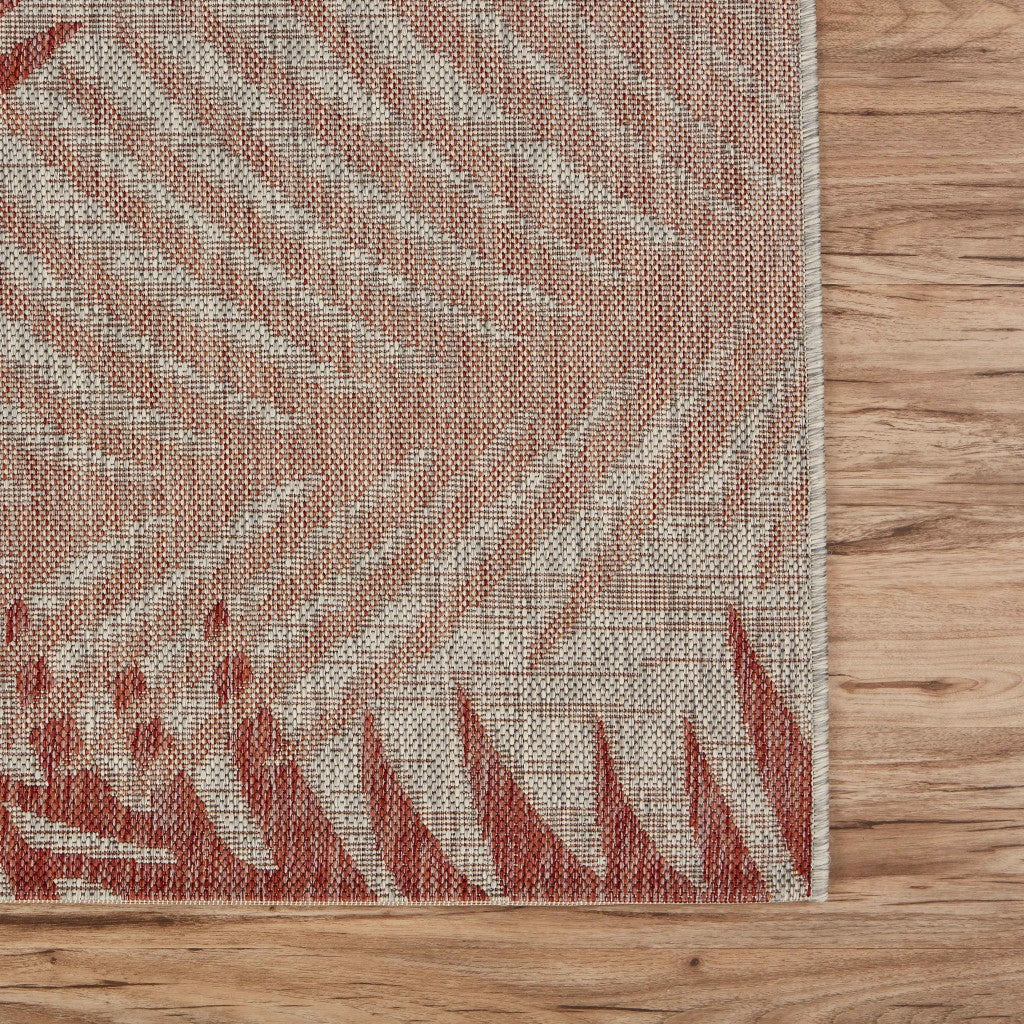 HomeRoots 8’ x 9’ Palm Leaves Indoor Outdoor Area Rug in Red Finish