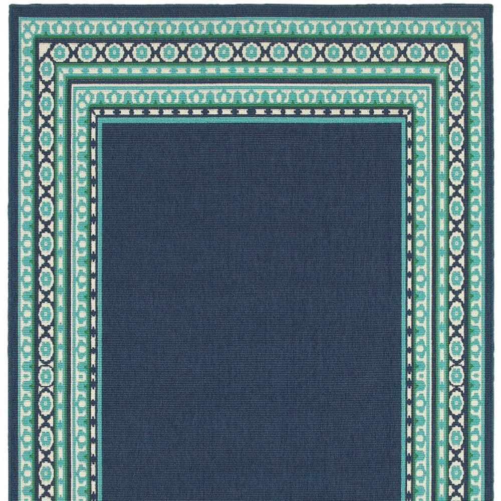 HomeRoots 9’ x 13’ Navy and Green Geometric Indoor Outdoor Area Rug