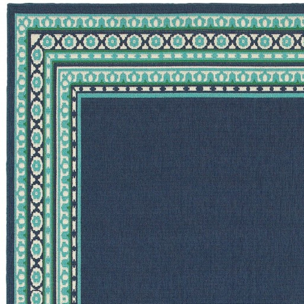 HomeRoots 9’ x 13’ Navy and Green Geometric Indoor Outdoor Area Rug