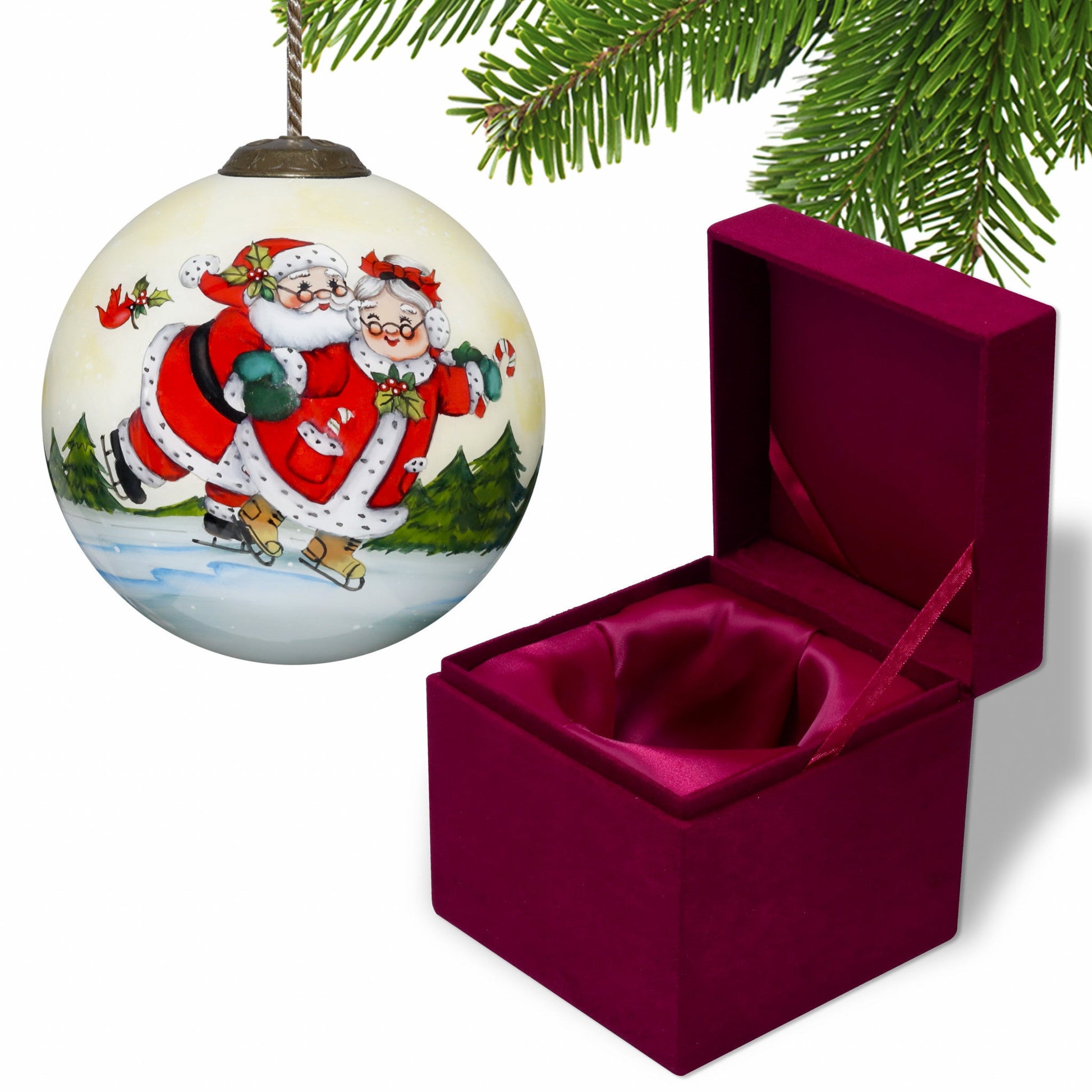 HomeRoots Ice Skating Mr. and Mrs. Santa Hand Painted Mouth Blown Glass Ornament