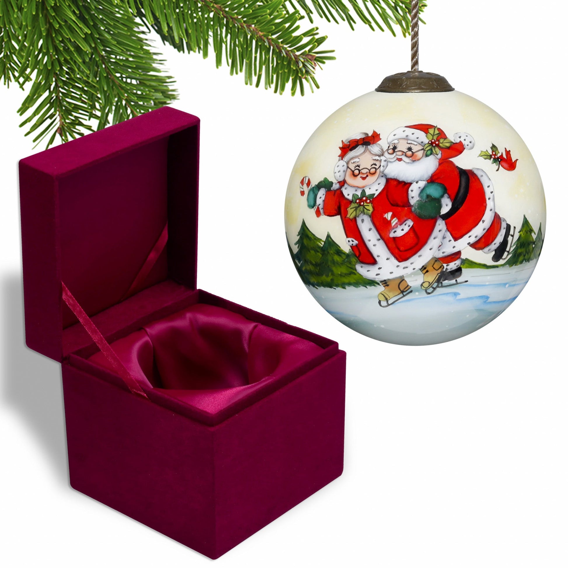 HomeRoots Ice Skating Mr. and Mrs. Santa Hand Painted Mouth Blown Glass Ornament