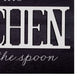 HomeRoots In This Kitchen We Lick The Spoon Wall Art