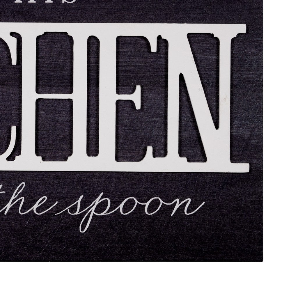 HomeRoots In This Kitchen We Lick The Spoon Wall Art