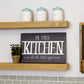 HomeRoots In This Kitchen We Lick The Spoon Wall Art