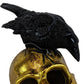 HomeRoots LED Gold Skull and Black Crow Sculpture