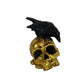 HomeRoots LED Gold Skull and Black Crow Sculpture