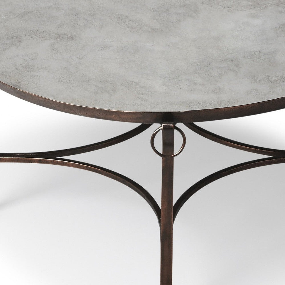 HomeRoots Metal and Mirrored Coffee Table in Copper Finish