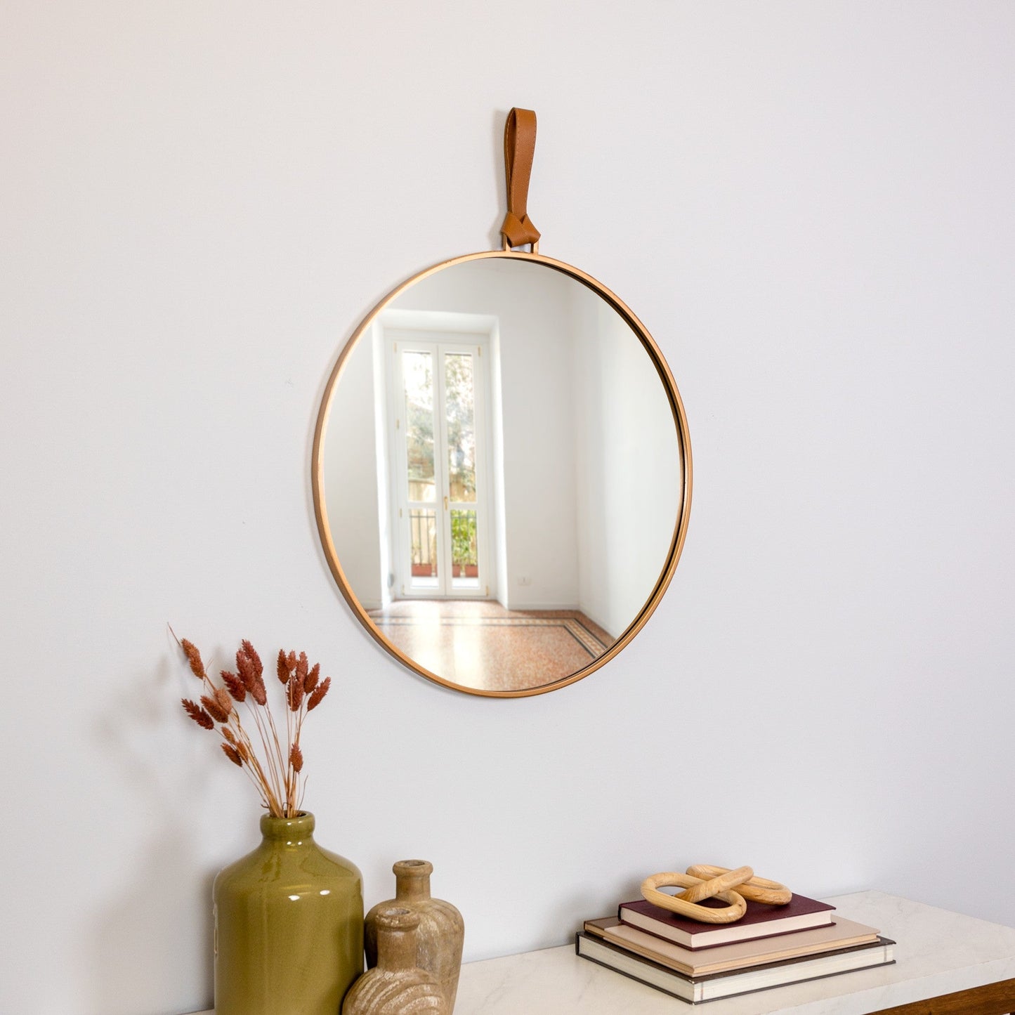 HomeRoots Minimalist Gold Round Mirror with Leather Strap