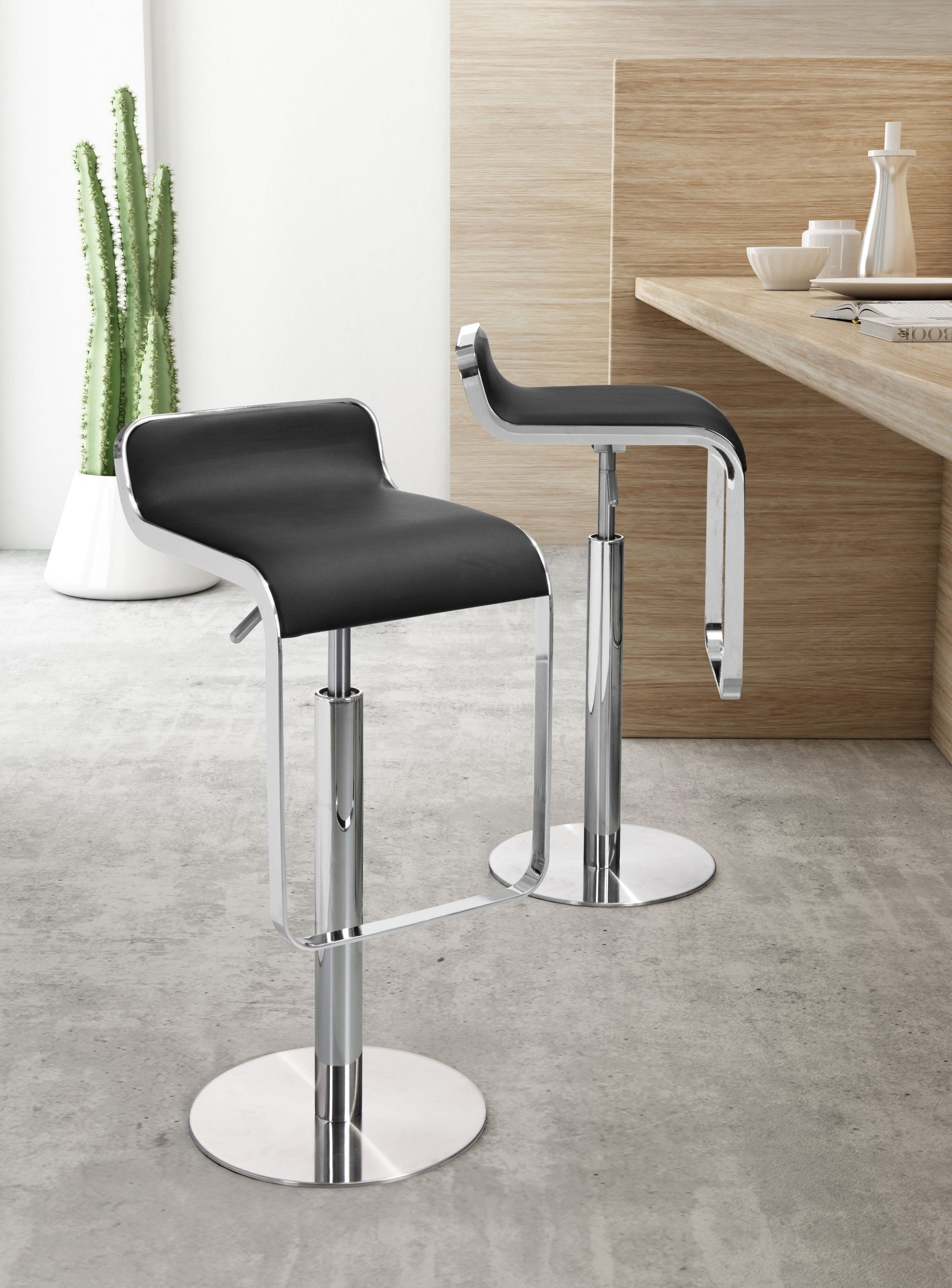 HomeRoots Modern Faux Leather and Chrome Adjustable Pedestal Barstool in Black Finish