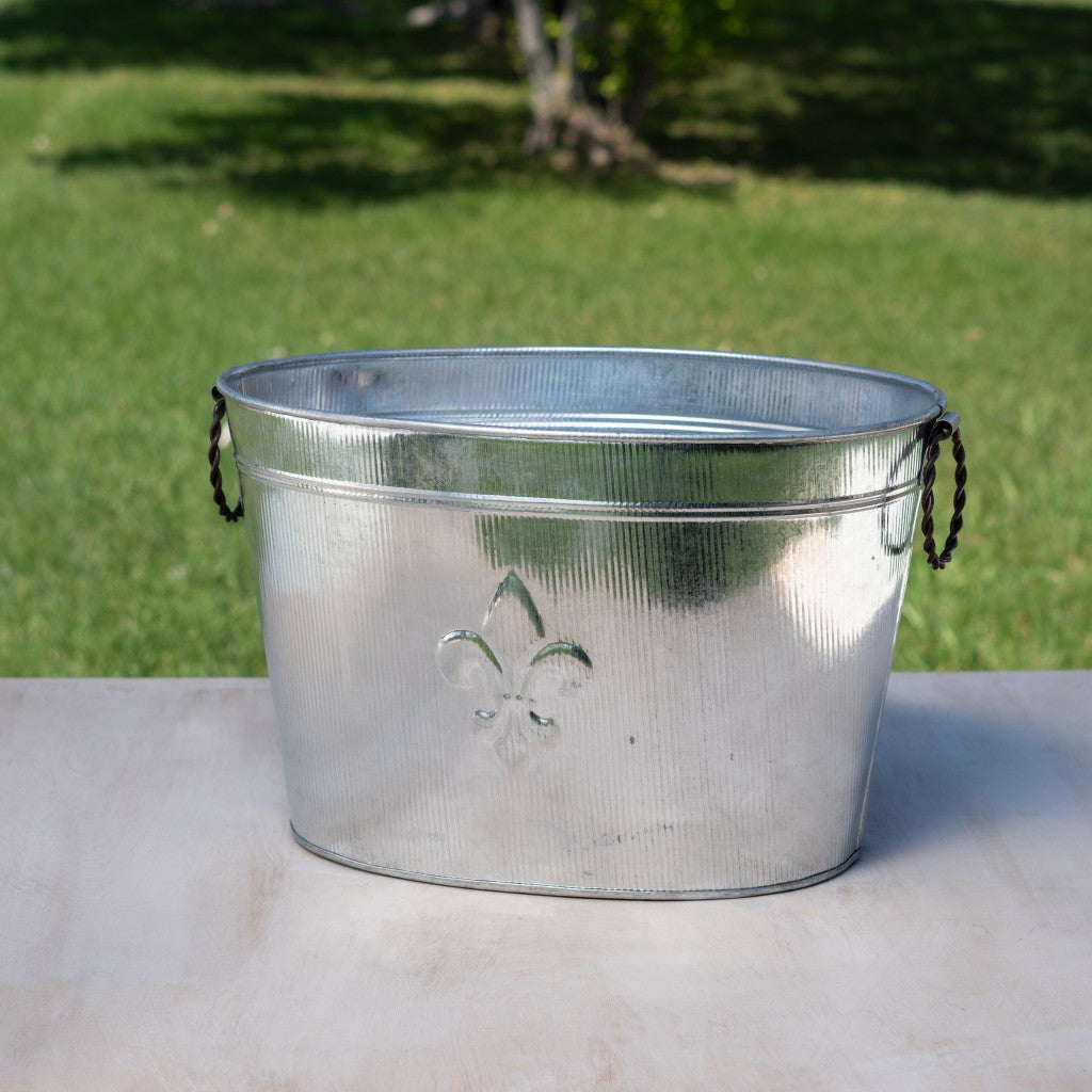 HomeRoots Oval Ribbed Fleur de Lis Beverage Tub in Silver Finish