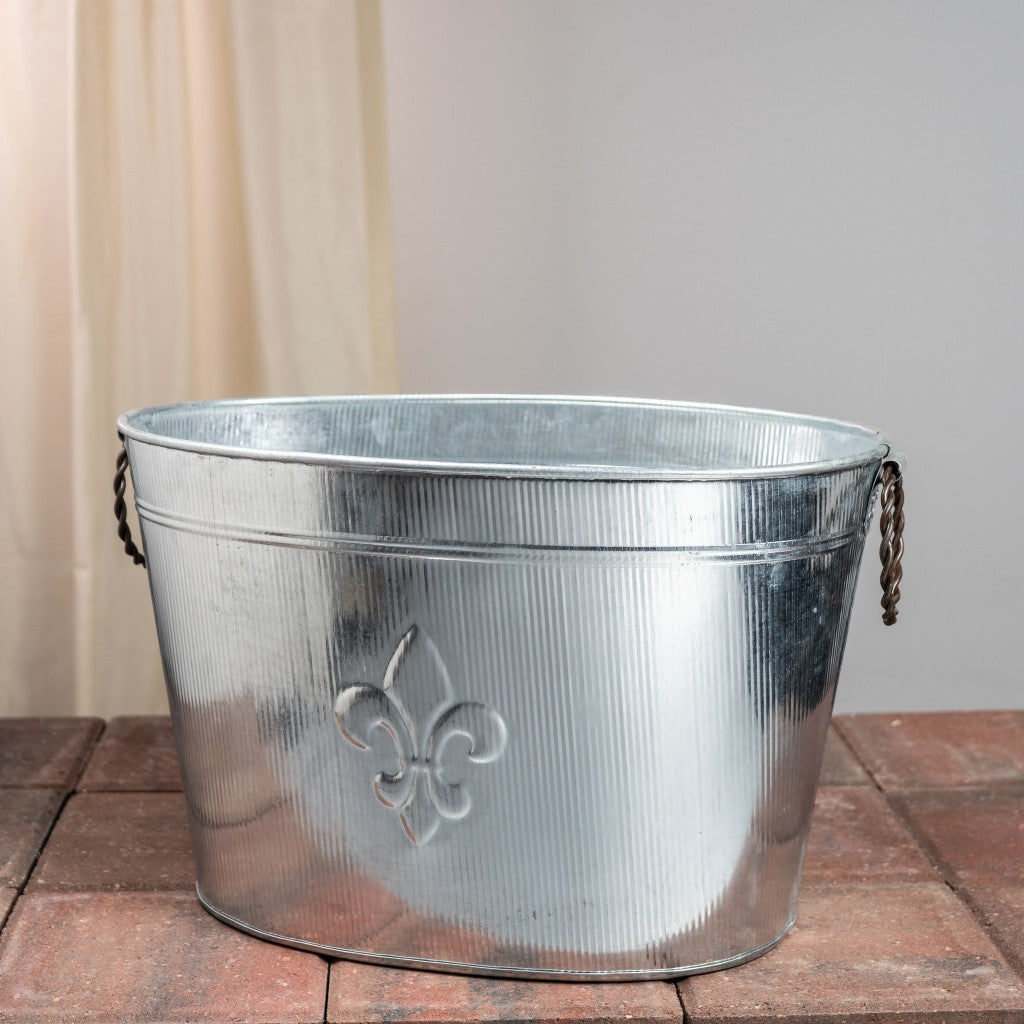 HomeRoots Oval Ribbed Fleur de Lis Beverage Tub in Silver Finish