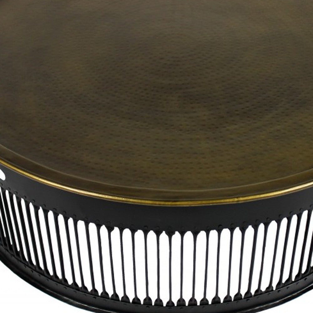 HomeRoots Round Drum Shaped Brass Coffee Table With Black Finish