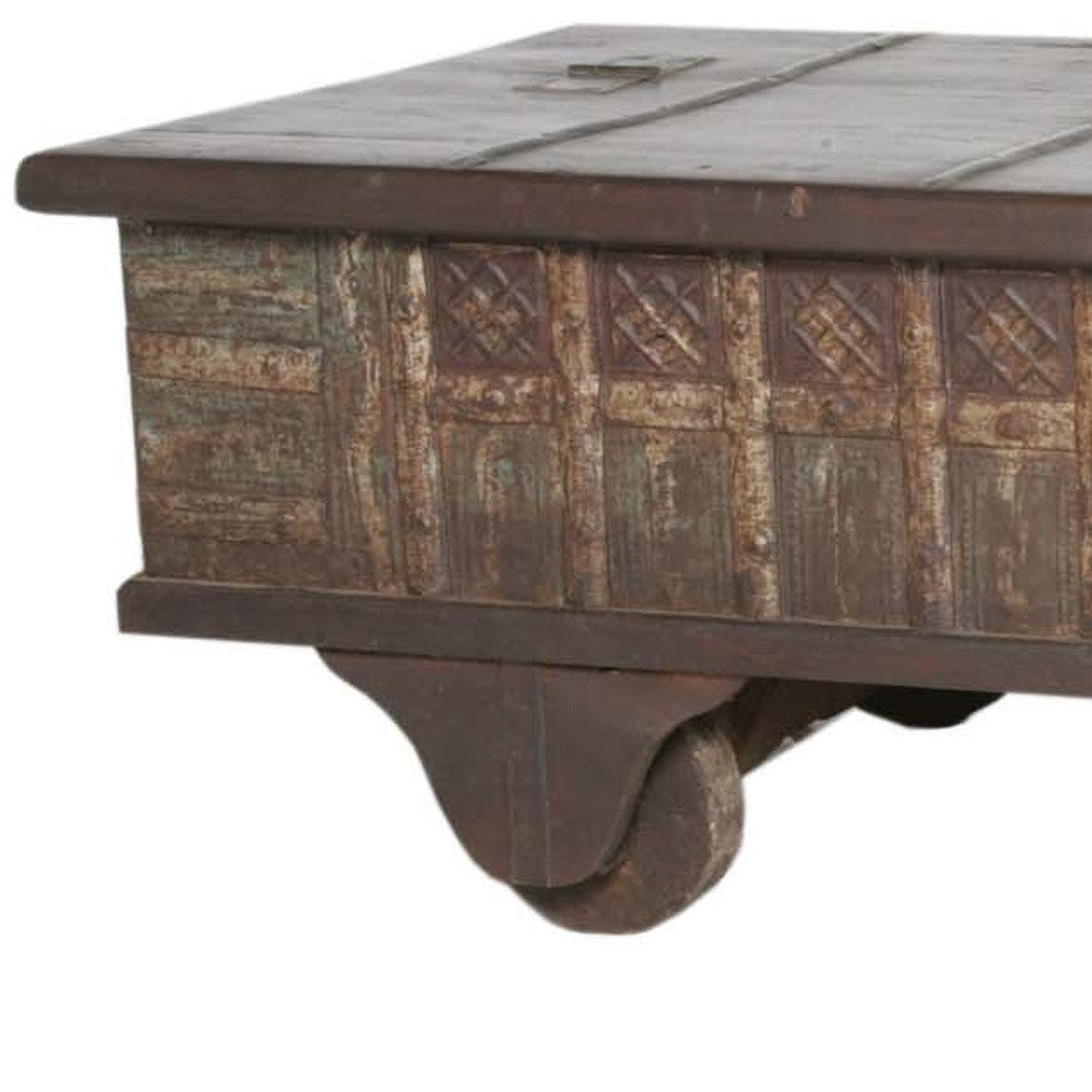 HomeRoots Wheel Antique Coffee Table in Brown Finish