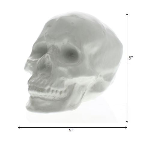 HomeRoots White Ceramic Skull Sculpture
