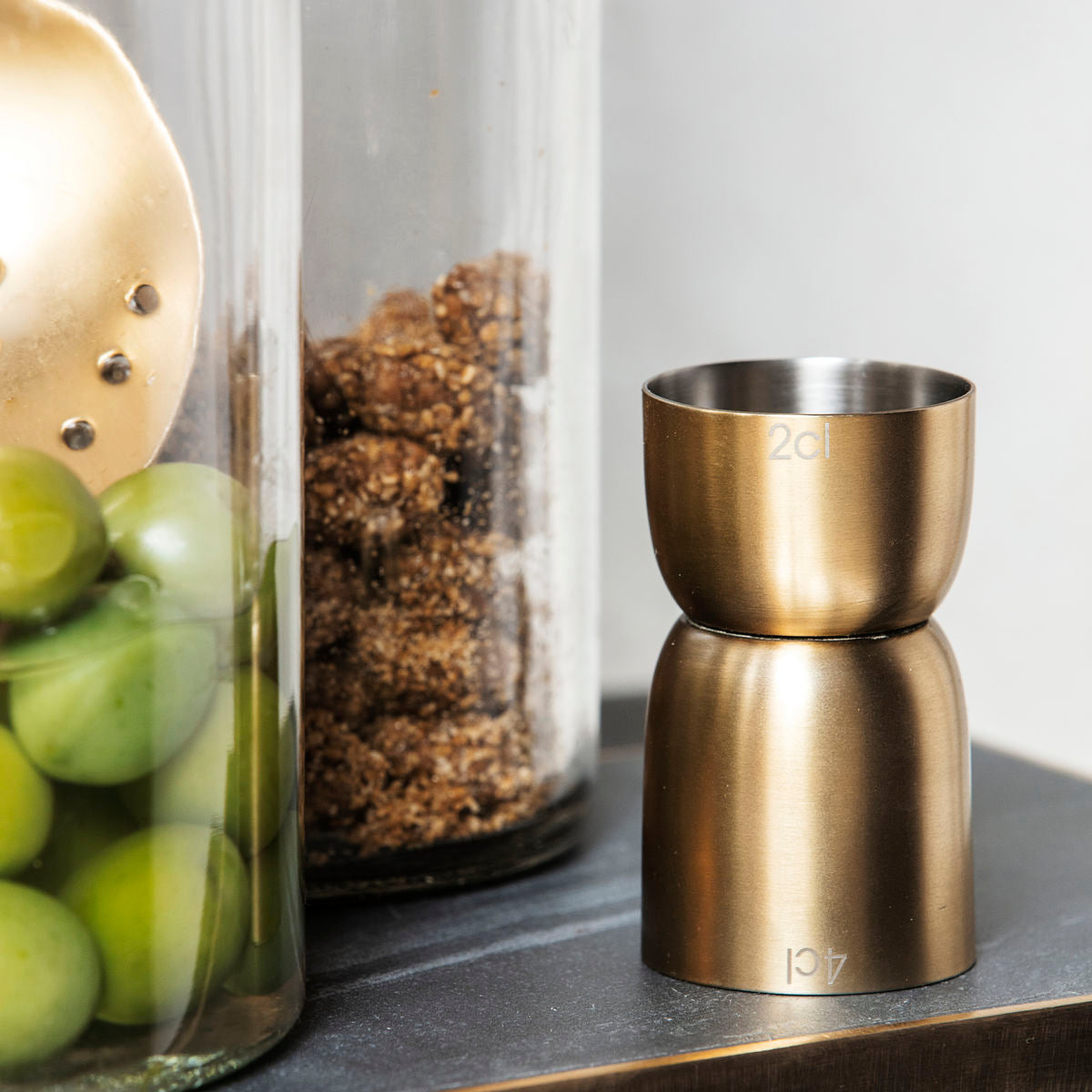 House Doctor Alir Measuring Cup in Brass Finish