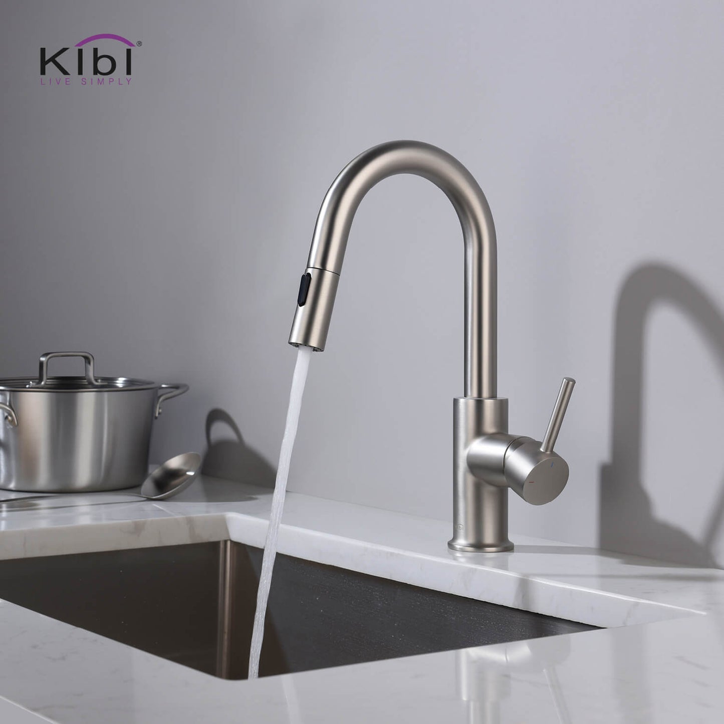 Kibi Luxe Single Handle High Arc Pull Down Kitchen Faucet With Soap Dispenser in Brushed Nickel Finish