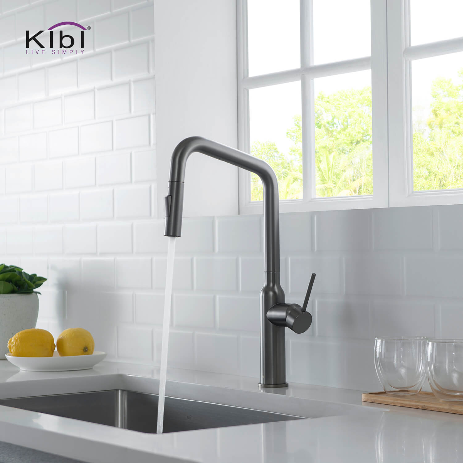 Kibi Macon Single Handle High Arc Pull Down Kitchen Faucet With Soap Dispenser in Titanium Finish