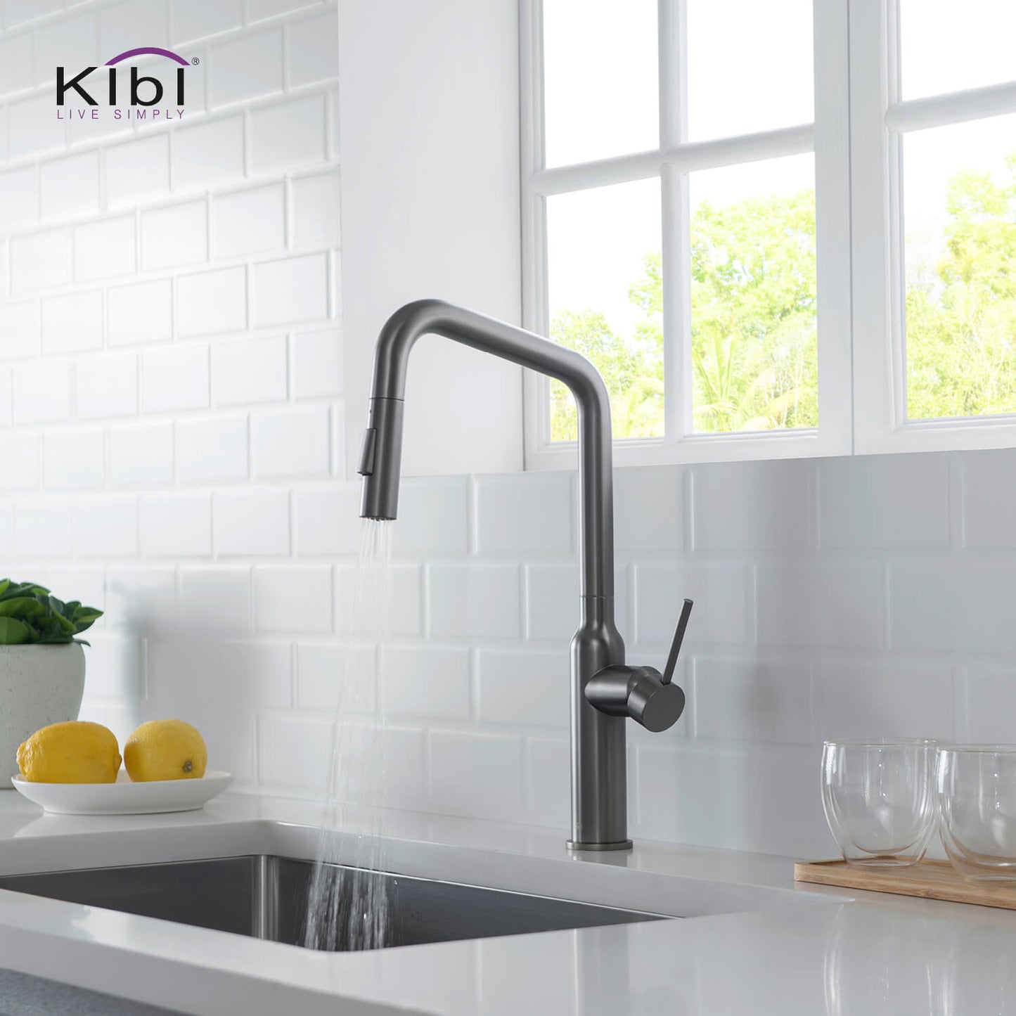 Kibi Macon Single Handle High Arc Pull Down Kitchen Faucet With Soap Dispenser in Titanium Finish