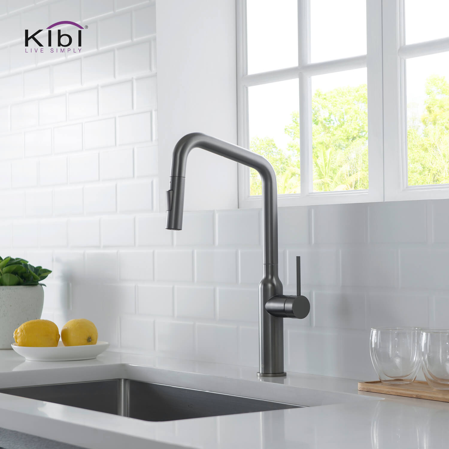 Kibi Macon Single Handle High Arc Pull Down Kitchen Faucet With Soap Dispenser in Titanium Finish