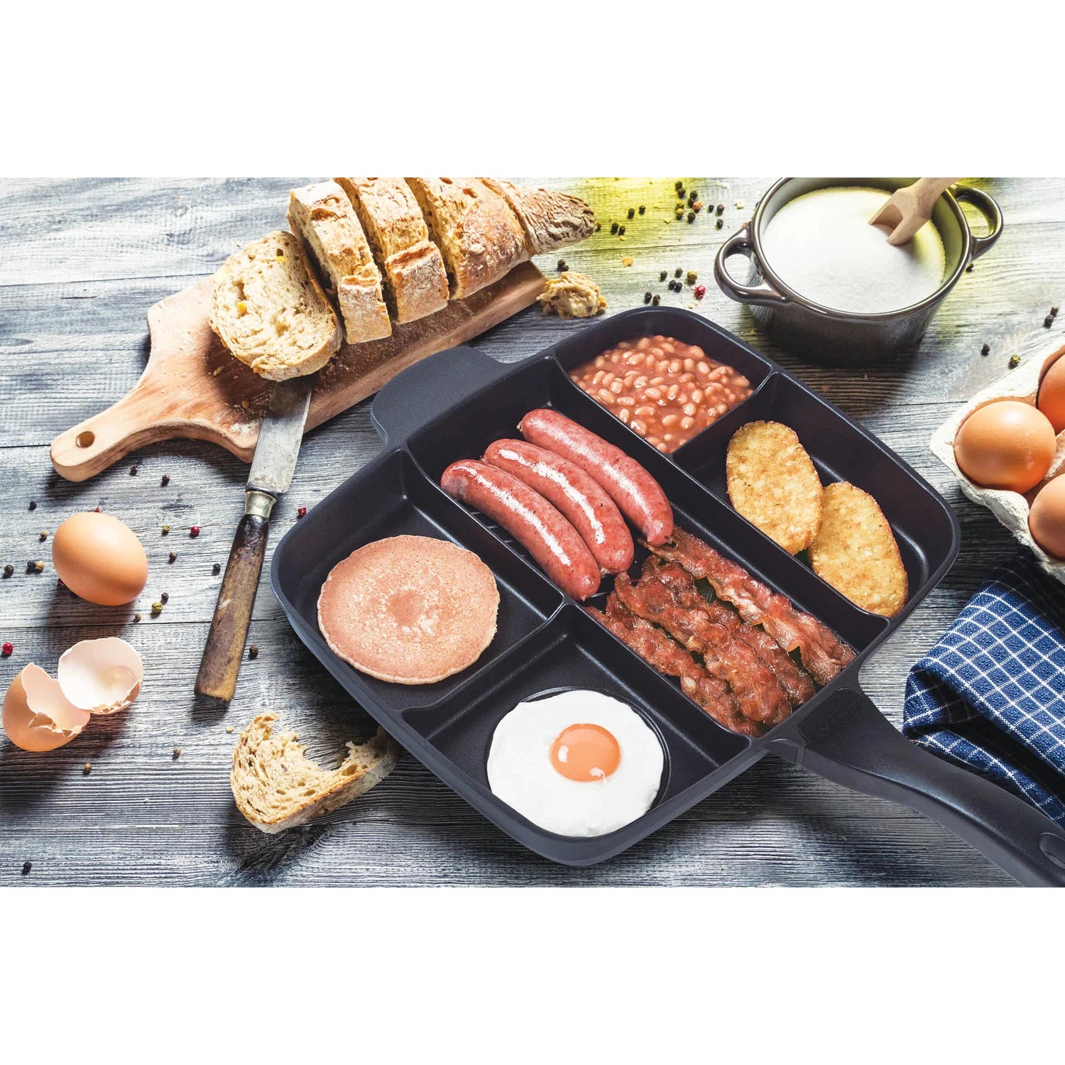 https://kitchenoasis.com/cdn/shop/files/MASTERPAN-Innovative-Series-15-5-Section-Non-stick-Cast-Aluminum-Grill-and-Griddle-Skillet-6.webp?v=1701399920&width=1946