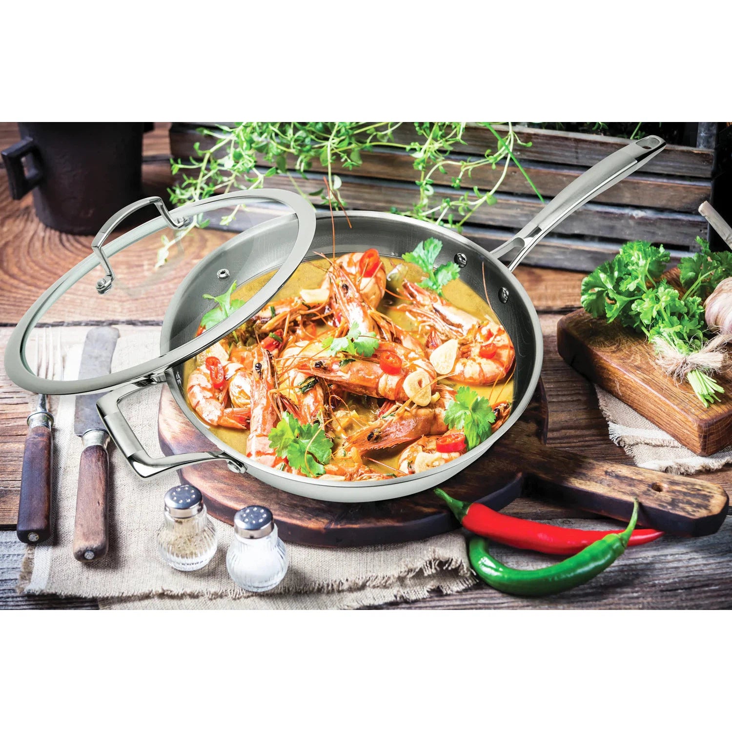 https://kitchenoasis.com/cdn/shop/files/MASTERPAN-Premium-Series-12-Chefs-Wok-and-Glass-Lid-3-Ply-Stainless-Steel-and-Aluminum-Scratch-Resistant-9.webp?v=1701399968&width=1946