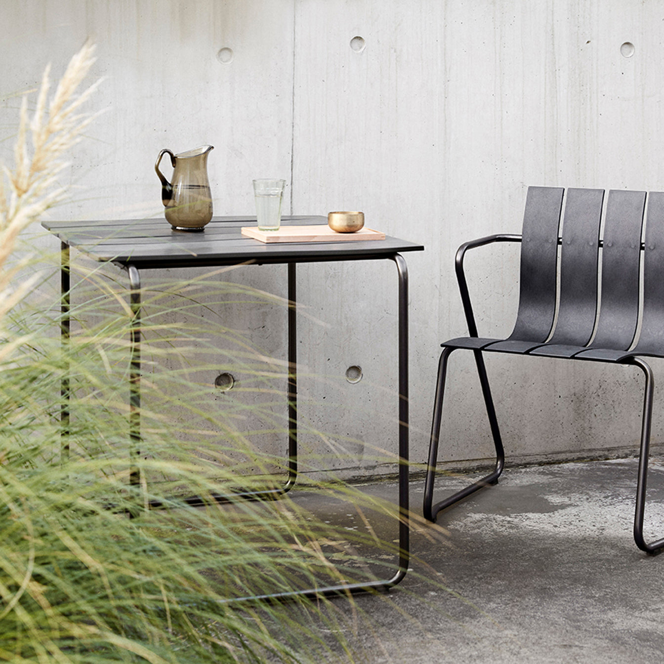 Mater Ocean Table, Black Recycled Materials With Gunmetal Frame by Jørgen & Nanna Ditzel