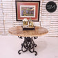 Mexports by Susana Molina 48" Peach Travertine Bullnose Edge Round Dining Table With Wrought Iron Base