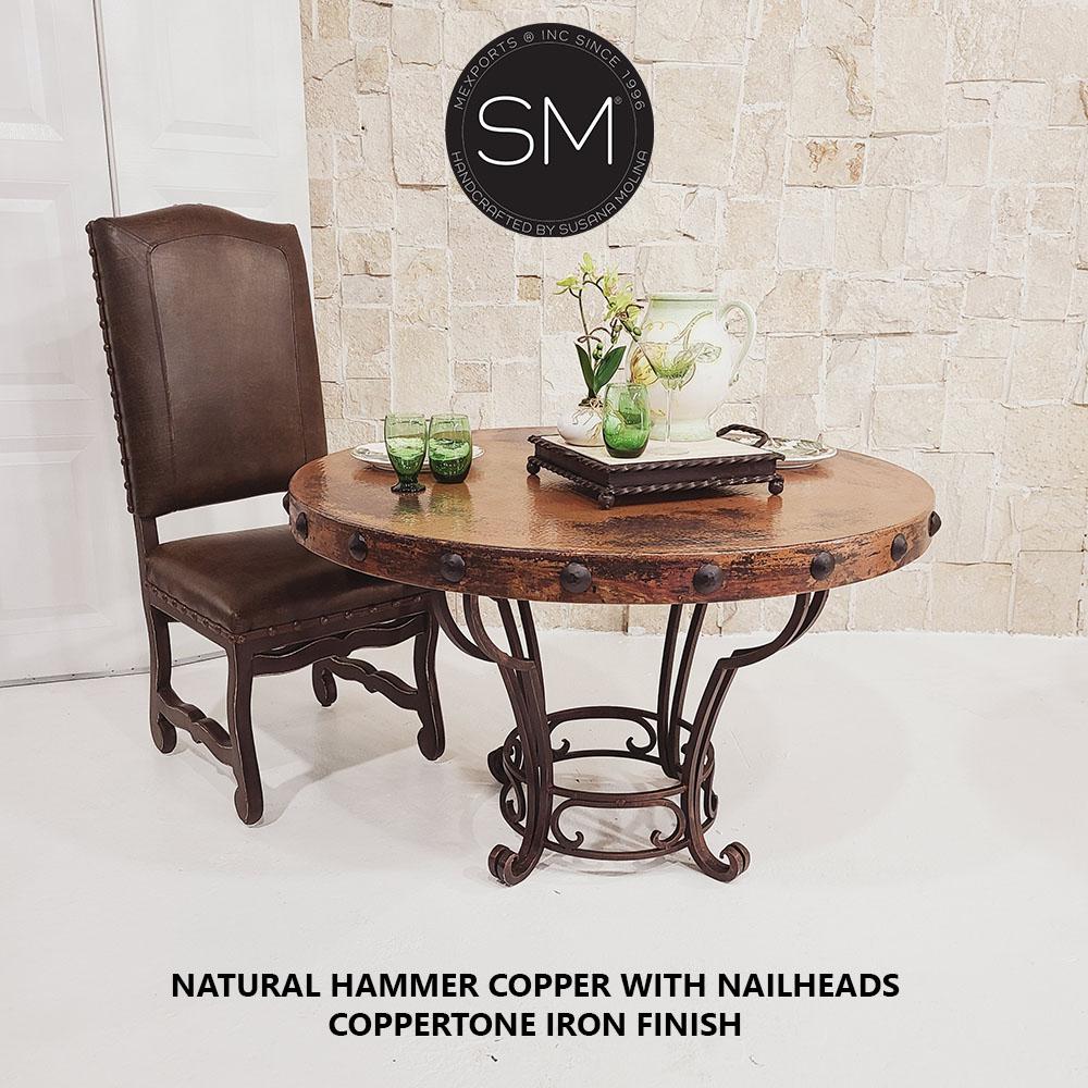 Mexports by Susana Molina 48" x 30" Natural Hammer Copper Top With Nailheads and Iron Base Round Dining Table